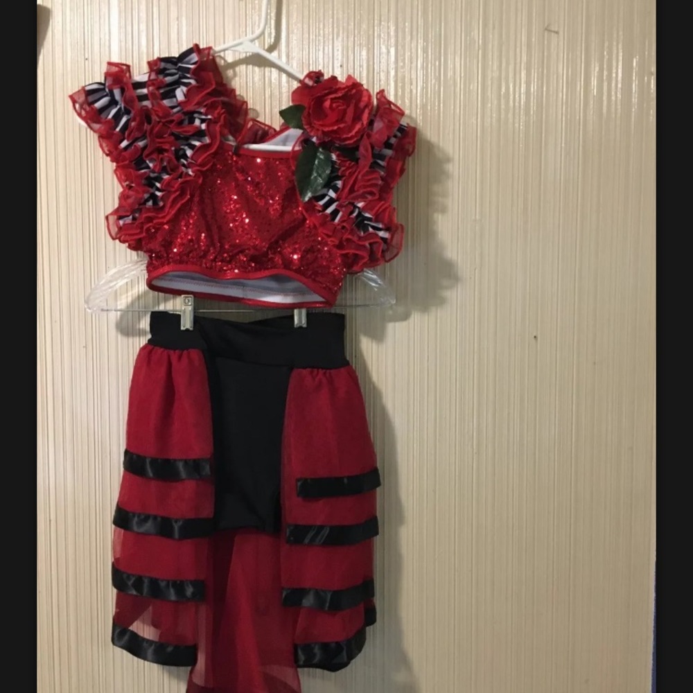 Red two piece costumes, and head piece included.